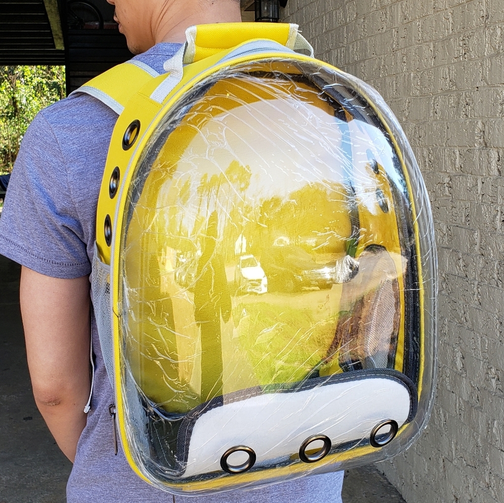 Yellow cat carrier backpack hiking travelling